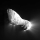 Illustration for article titled Spacecraft zooms in for a close look at the cold heart of a burning comet
